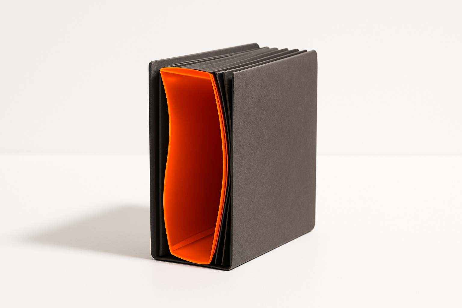 Charcoal accordion folder with one orange-lacquered pocket bulging open, symbolizing how a cmo should fund ai when the market